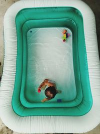 High angle view of stuffed toy in swimming pool