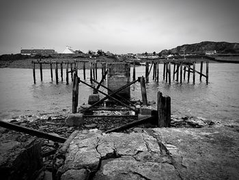 Wooden pier in front of sea