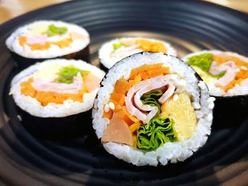 Close-up of sushi served in plate