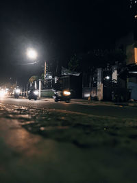 Illuminated street at night