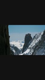 Scenic view of snowcapped mountains