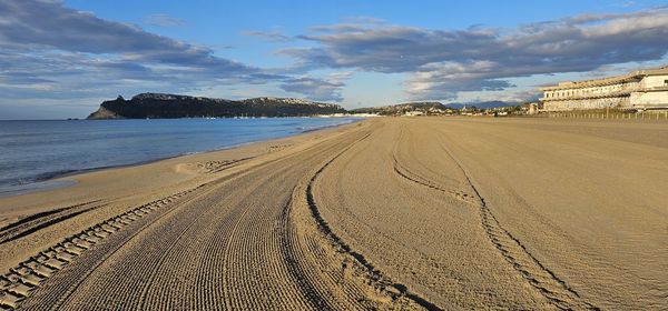 Scenic view of beach against sky