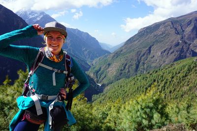 Portrait of man against mountains