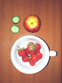 High angle view of fresh fruits in plate on table