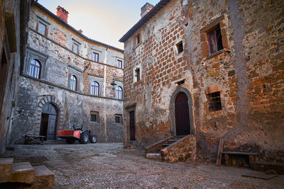 Street amidst old buildings in town