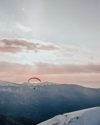 Scenic view of snowcapped mountain against sky