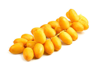 Close-up of oranges against white background