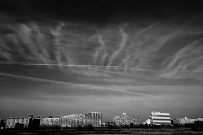 Low angle view of building against cloudy sky