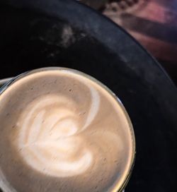 Close-up of cappuccino on table