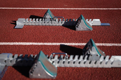 Tilt-shift image of equipment on running tracks