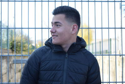 Portrait of young man looking away