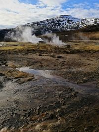 Volcanic landscape against sky