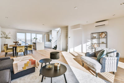 View of chair and table in living room