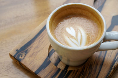 High angle view of cappuccino on table