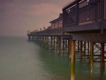 View of pier at sunset