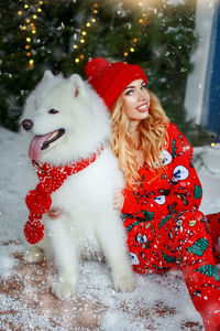 Portrait of young woman in snow