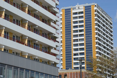 Low angle view of buildings in city against sky