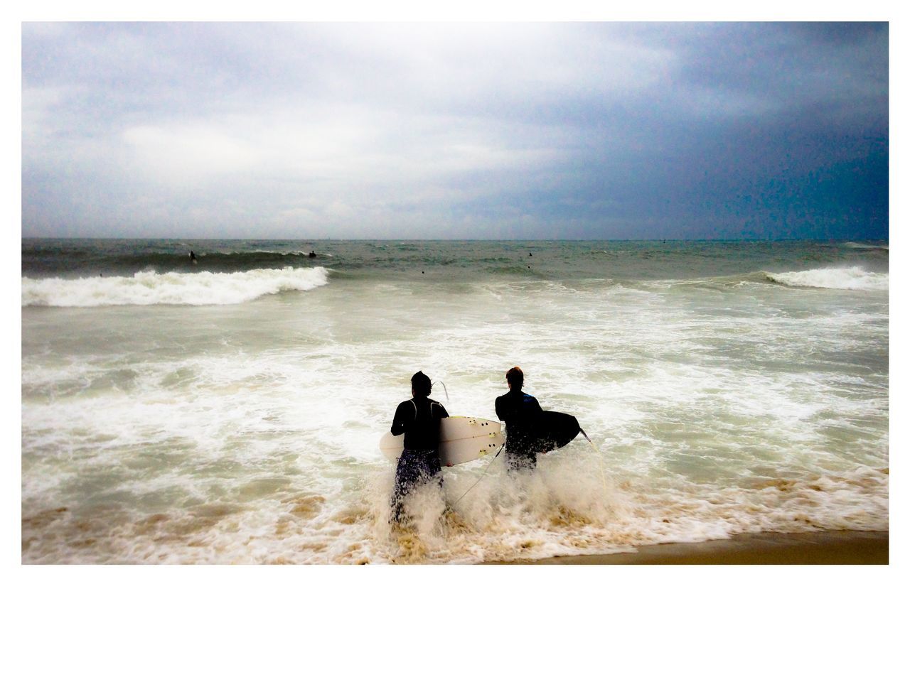 sea, water, horizon over water, beach, transfer print, sky, shore, auto post production filter, leisure activity, scenics, lifestyles, beauty in nature, cloud - sky, tranquil scene, tranquility, men, wave, vacations, nature