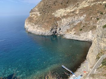 High angle view of rock formation in sea