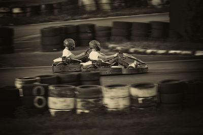 Two men during a cart race