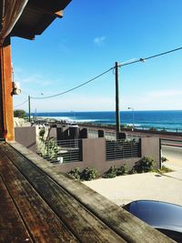 Scenic view of sea against blue sky