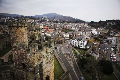 High angle view of conwy castle and buildings in town