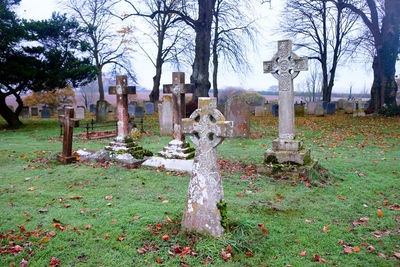 View of cross in cemetery