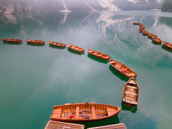 High angle view of boats moored in lake