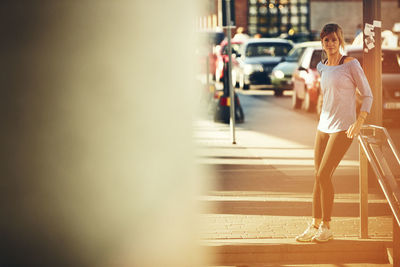 Young jogger standing