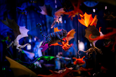 We are all mad here. flying characters from fantasy movies of magic on a shallow depth of field