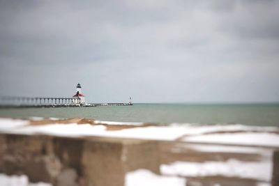 Man on beach against sky