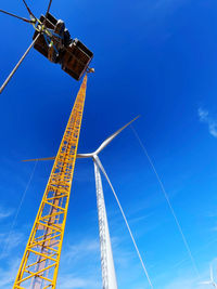 Crane boom and wind turbine during mce