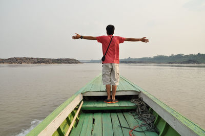 Man standing on pier