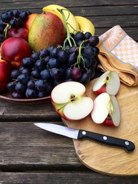 High angle view of fruits on wooden table