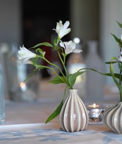 Close-up of flower vase on table