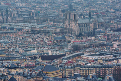 A high-view of the center of paris, france in low light.