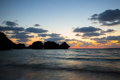 Scenic view of sea against sky during sunset