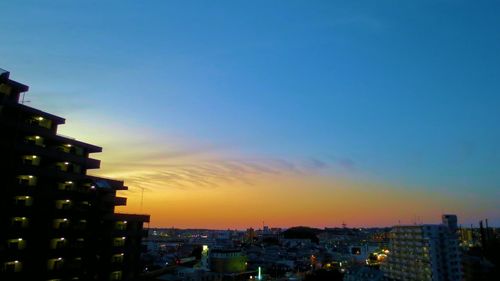 View of cityscape at sunset