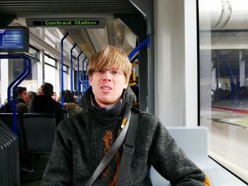 Portrait of man traveling in metro train