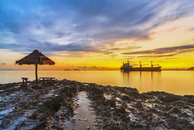 Scenic view of sea against sky during sunset