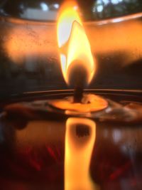 Close-up of burning candle