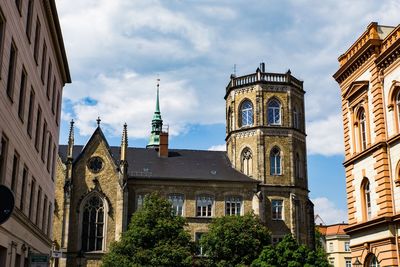 Low angle view of buildings against sky