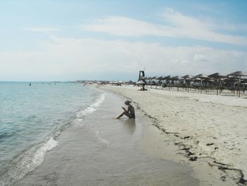 Scenic view of beach against sky