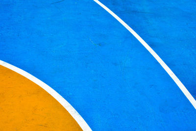 High angle view of basketball hoop against blue sky