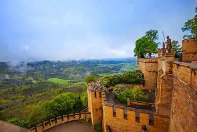 View of historic building against cloudy sky