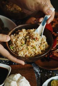 Midsection of person preparing food