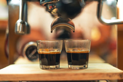 Close-up of coffee served on table