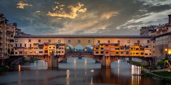 Medieval bridge ponte vecchio, old bridge, and the arno river, florence