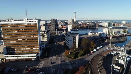 High angle view of street amidst buildings in city