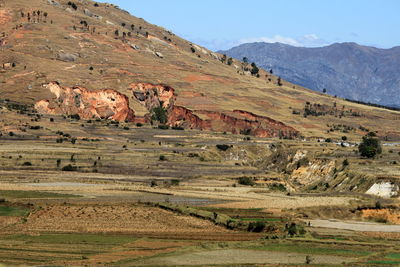 Scenic view of landscape and mountains against sky